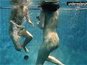 two splendid amateurs demonstrating their figures off under water
